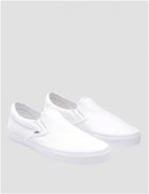 Bild Vans, UA Classic Slip-On, Vit, Skor till Unisex, 37