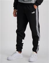 Bild Puma, ESS+ COLORBLOCK PANTS FL CL B, Svart, Byxor till Kille, 164 cm